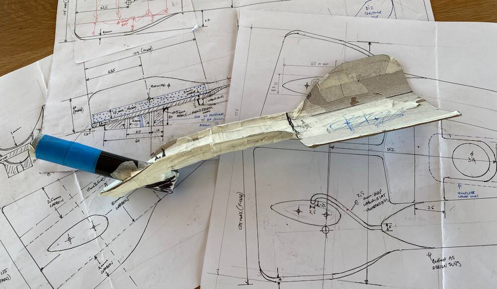 Initial concept drawings and cardboard mockup (June 2021)